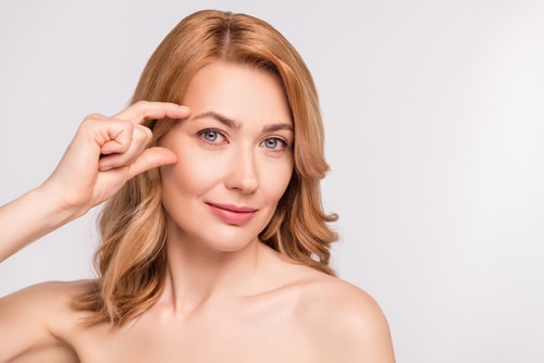 woman after shower naked shoulders got wrinkles